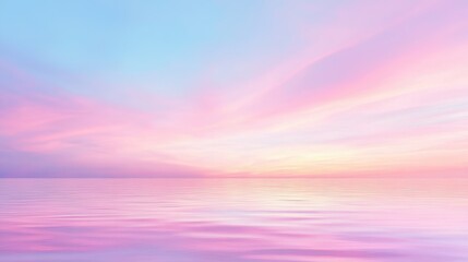 Wall Mural - a beautiful pink and blue sky with a calm ocean in the background