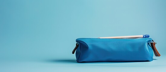 Poster - Product photo for business featuring a blue pencil case on a white background with copy space image