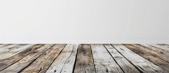 Wall Mural - Rustic wooden planks against a white wall providing an empty background for product display and text with a copy space image