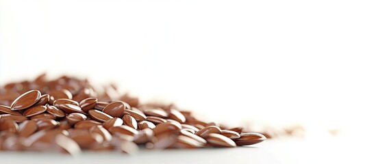 Poster - Flax seeds on sipano at the edge of the frame against a white background with copyspace