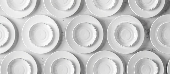 Poster - White empty plates on a white culinary backdrop Kitchen and cooking template mock up Top view. with copy space image. Place for adding text or design