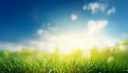 A fresh spring blue sunny sky background with blurred warm sunny glow.