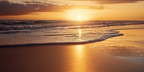 A serene sunset scene with gentle ocean waves caressing the sandy shoreline, creating a peaceful and calming ambiance.