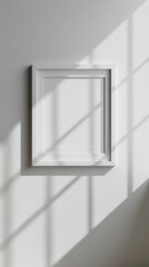 Poster - The striking contrast of shadows from window panes creates a captivating play of light on a blank white frame