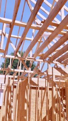 Wall Mural - An under construction timber truss framed house with roofing joints