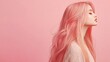 © Iswanto - Profile view of a young woman with long pink hair against a pink background.