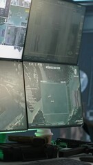 Poster - Vertical video Close up of screens in empty control center housing operational missile defense system designed to intercept ballistic threats. Monitors in army headquarters used for tracking rockets