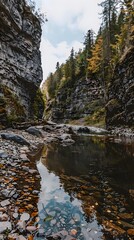 Wall Mural - Autumn Landscape with Rocky Cliffs and Stream