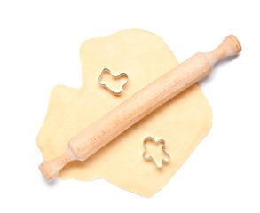 Canvas Print - Raw dough, wooden rolling pin and cookie cutters isolated on white, top view