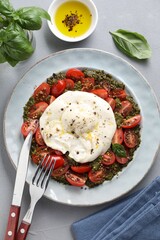 Sticker - Fresh delicious burrata salad served on light grey table, top view