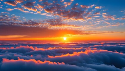 Wall Mural - At sunrise, the sun shines on the clouds, reflecting gorgeous colors, and beautiful mountains are vaguely visible in the distance.