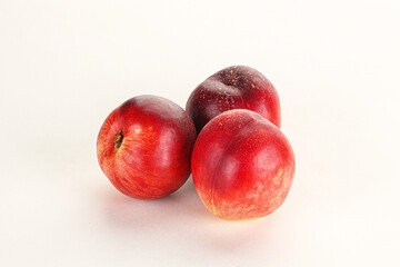 Ripe sweet juicy nectarines heap