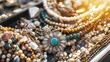 © Bonsales - Closeup of a variety of beautiful vintage costume jewelry including necklaces, bracelets, earrings displayed on a black background.