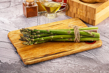 Canvas Print - Vegan raw green asparagus heap