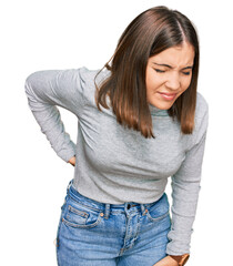 Sticker - Young beautiful woman wearing casual turtleneck sweater suffering of backache, touching back with hand, muscular pain