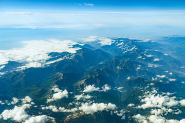 Wall Mural - aerial view of mountain range in fog