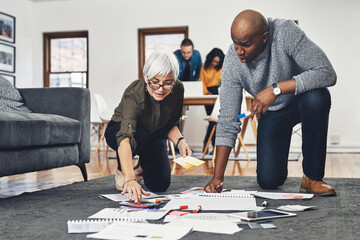 Poster - Planning, floor and people with paperwork, creative and discussion for choice of color and pallet. Diversity, teamwork and mature woman with employee, graphic designer and brainstorming in office