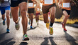 © Loliruri - A group of men runners running in a road race, marathon run contest, macro feet shot