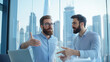 © Kateryna - Team members discussing a project in a glass-walled conference room, with the city skyline in the background, one colleague points out details while the other takes notes on a lapt