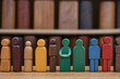© Wojciech - Wooden and colored figures representing diversity and inclusion. DEIB. Diversity, Equity, Inclusion, Belonging. Multiracial culture. Black, White, Asian, Red, Indian, Arab, African. Diverse team