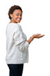 © Krakenimages.com - Beautiful young african american woman wearing sweater over isolated background Pointing to the side with hand and open palm, presenting ad smiling happy and confident