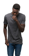 Sticker - Young african american man wearing grey t-shirt feeling unwell and coughing as symptom for cold or bronchitis. Healthcare concept.