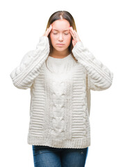 Sticker - Young beautiful caucasian woman wearing winter sweater over isolated background with hand on head for pain in head because stress. Suffering migraine.