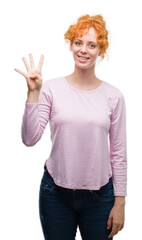 Sticker - Young redhead woman showing and pointing up with fingers number four while smiling confident and happy.