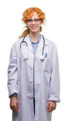 Poster - Young redhead woman wearing doctor uniform with a happy and cool smile on face. Lucky person.