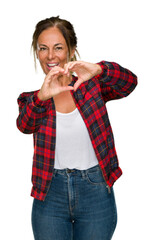 Canvas Print - Middle age adult woman wearing casual jacket over isolated background smiling in love showing heart symbol and shape with hands. Romantic concept.