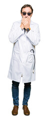 Poster - Handsome middle age doctor man wearing sunglasses shocked covering mouth with hands for mistake. Secret concept.