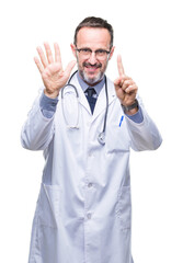 Wall Mural - Middle age senior hoary doctor man wearing medical uniform isolated background showing and pointing up with fingers number six while smiling confident and happy.