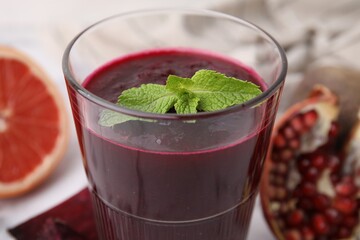 Sticker - Fresh beetroot smoothie with mint in glass on table, closeup