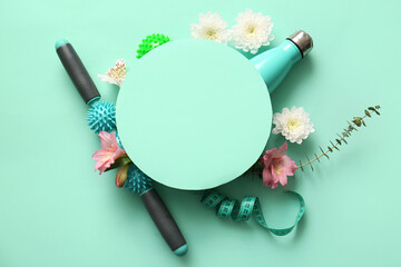 Wall Mural - Composition with blank card, sports equipment, measuring tape and flowers on color background