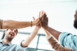 © peopleimages.com - Business people, hands and high five for teamwork, partnership or collaboration with celebration or agreement. Group, creative employees and workers for team support, success and diversity in agency