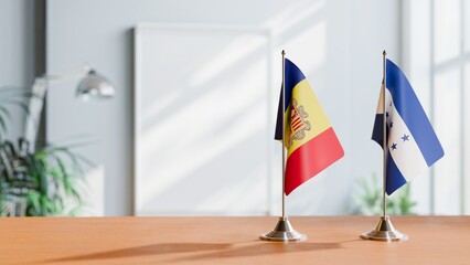 FLAGS OF ANDORRA AND HONDURAS  ON TABLE