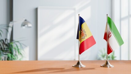 FLAGS OF ANDORRA AND IRAN  ON TABLE