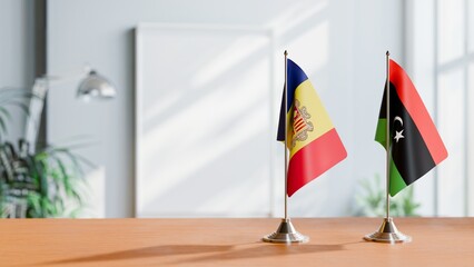 FLAGS OF ANDORRA AND LIBYA  ON TABLE