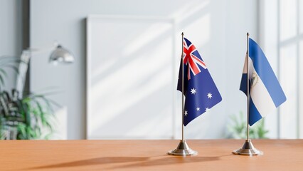 Wall Mural - FLAGS OF AUSTRALIA AND NICARAGUA  ON TABLE