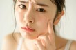 © Maki_Japan - 歯とお肌の悩みがある日本人女性（皮膚科・美容皮膚科・美容整形・ニキビ・虫歯）