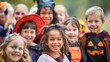 © Daria Lukoiko - Excited children are smiling and wearing their halloween costumes while enjoying a trunk or treat celebration with their friends