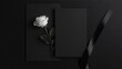 © fivan - Monochrome wedding invitation mockup on matte black paper, featuring white typography and minimalist design, styled with a single white rose and black ribbon