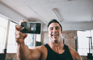 Wall Mural - Selfie, fitness and man in gym, bodybuilder and exercise with memory, influencer and training. Person, guy and athlete with smile, workout online challenge and content creator with internet and app