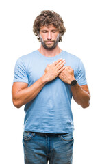 Sticker - Handsome hispanic model man over isolated background smiling with hands on chest with closed eyes and grateful gesture on face. Health concept.