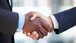 © ittipol - Close-up of business professionals engaged in a handshake in a contemporary office, representing corporate success and teamwork,generative ai