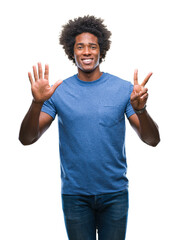 afro american man over isolated background showing and pointing up with fingers number seven while s