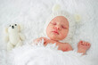 © Anna - cute little girl baby sleeping with teddy bear.