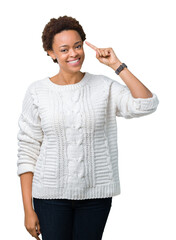 Sticker - Beautiful young african american woman wearing sweater over isolated background Smiling pointing to head with one finger, great idea or thought, good memory