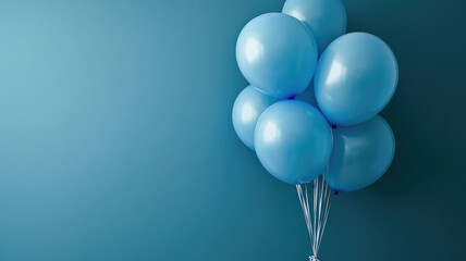 blue helium balloons on blue background with copy space. room decoration for a birthday party, concept of happiness and celebration. bunch of big blue balloons for wedding