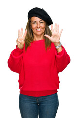 Poster - Middle age adult woman wearing fashion beret over isolated background showing and pointing up with fingers number eight while smiling confident and happy.